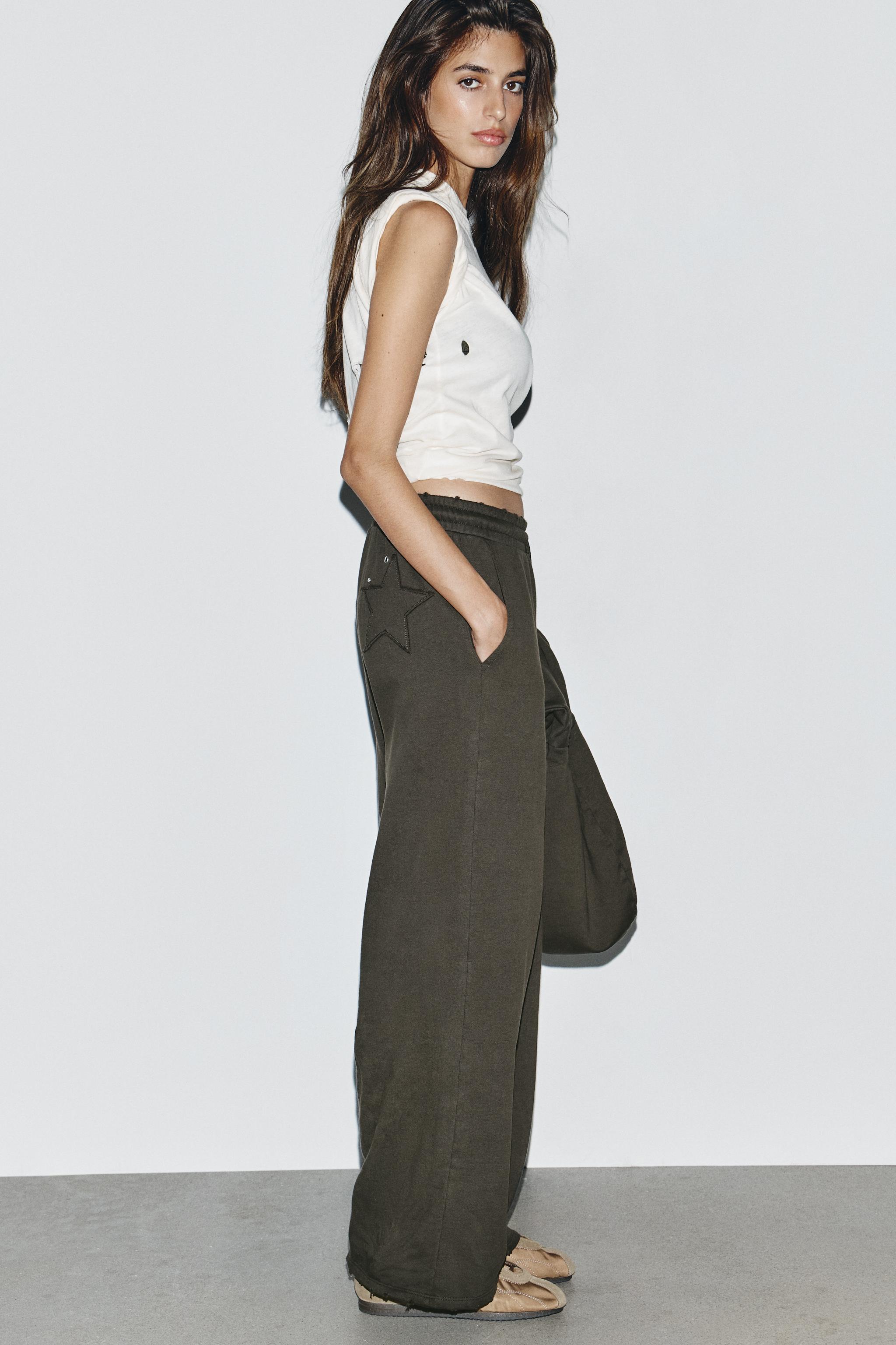 WASHED STAR STUDDED PANTS